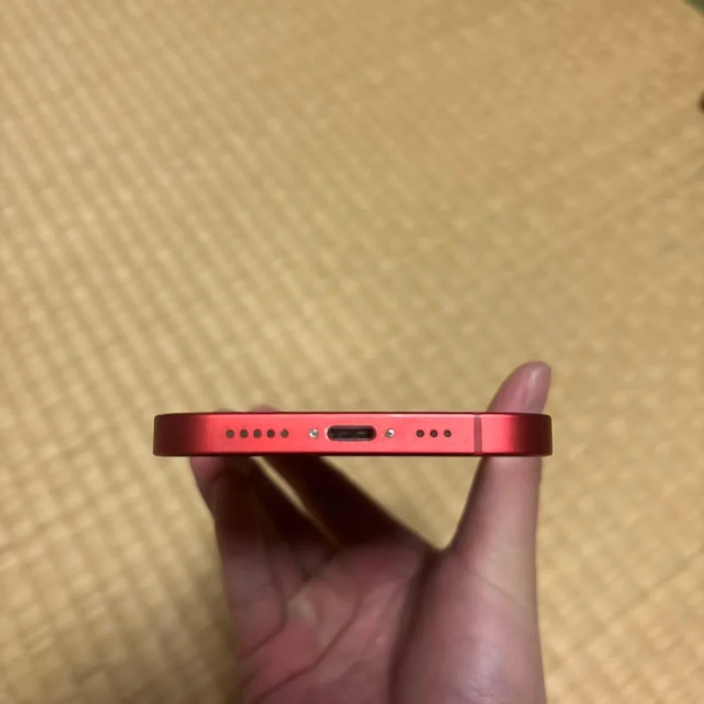 Apple Smartphone in Red with Blue Display